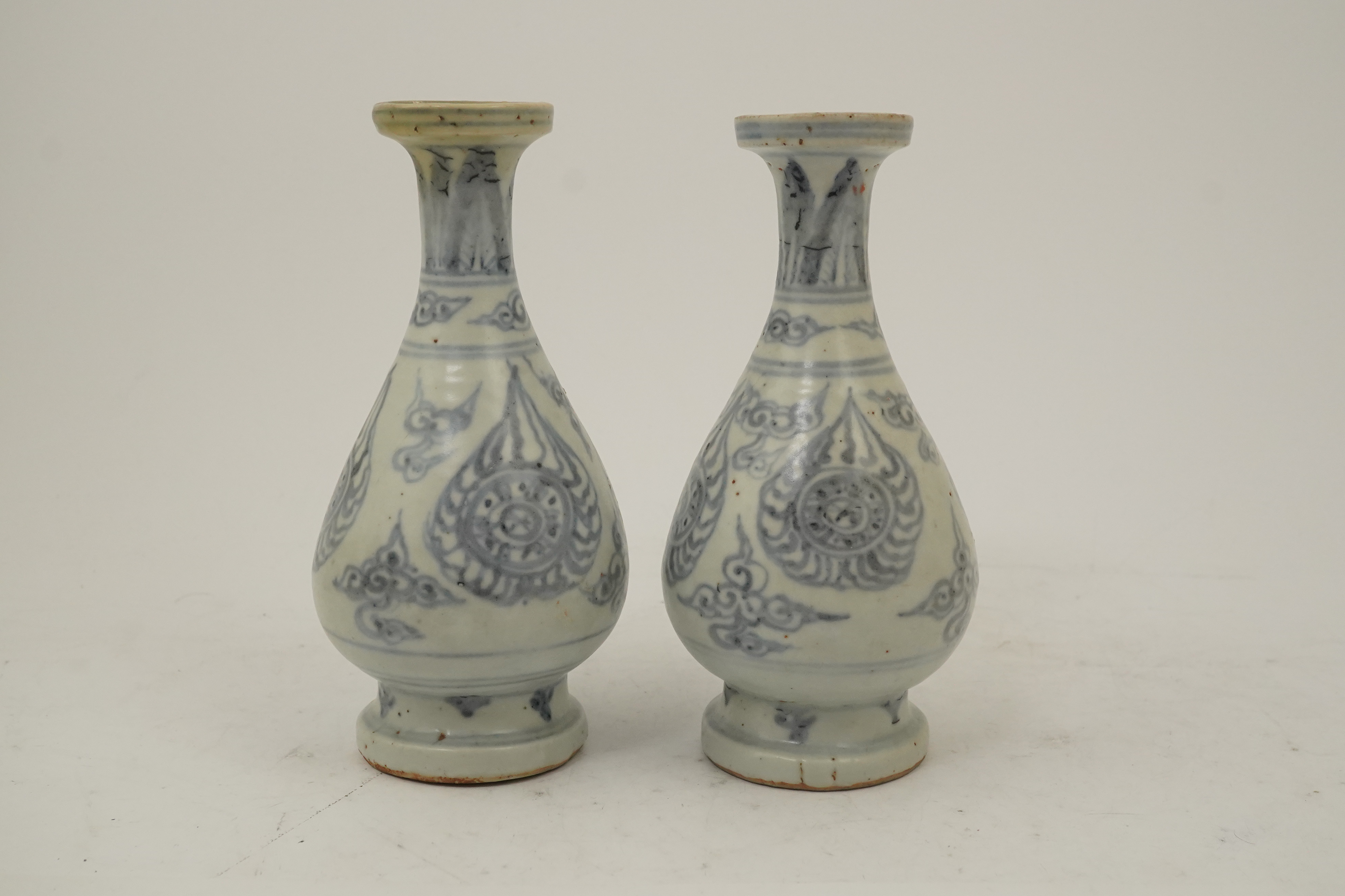 A pair of Chinese blue and white pear-shaped shipwreck vases, Ming dynasty, 15th century
